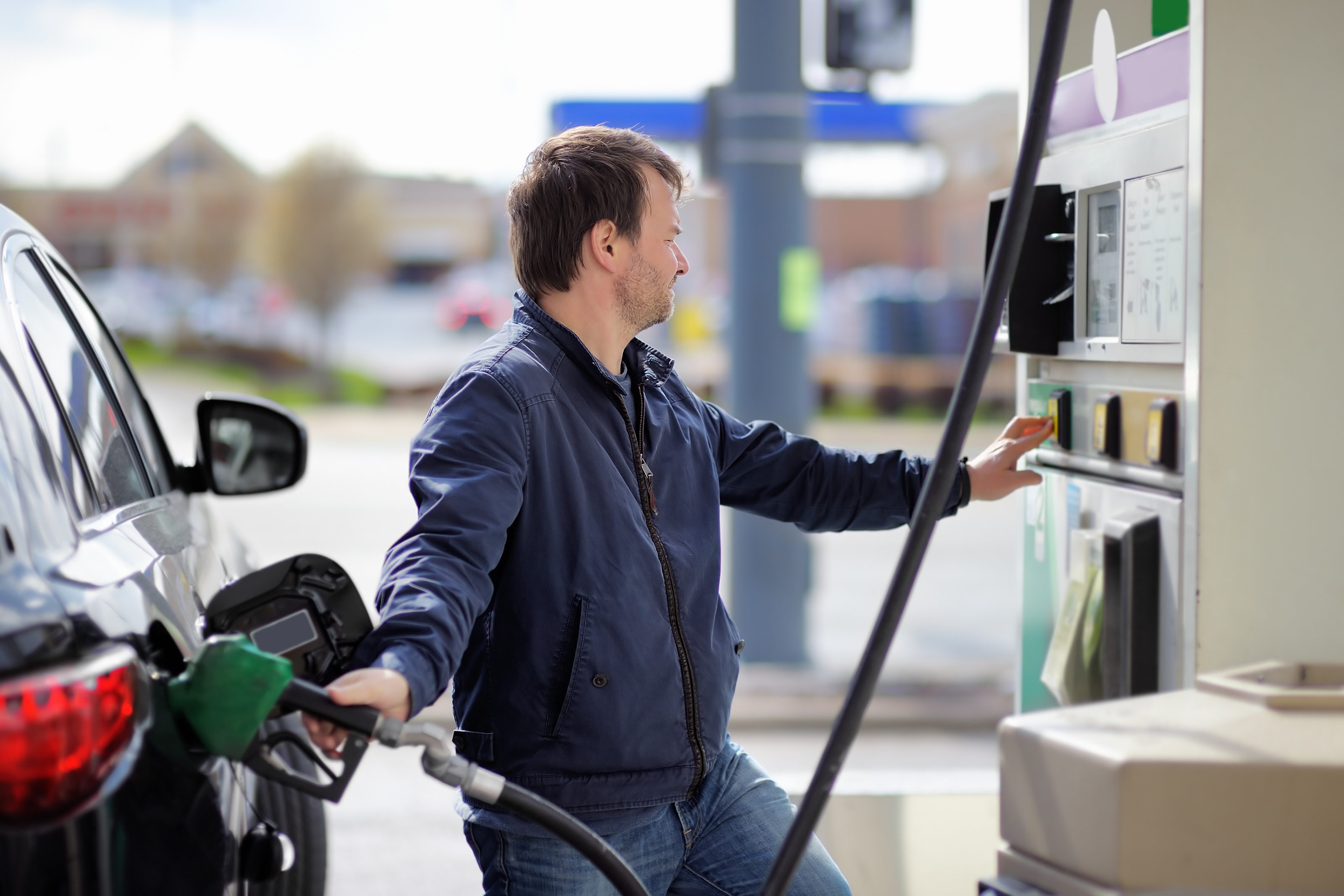 Man paying at the pump